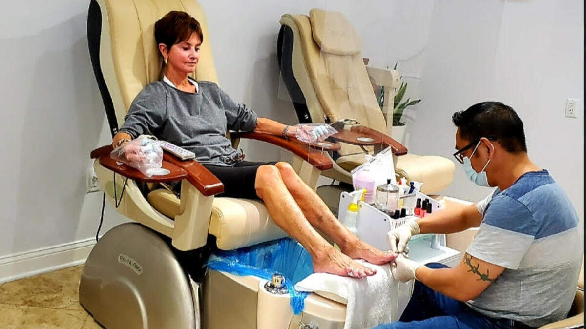 Angel Iannazzo relaxes for a pedicure with Tony at Color Me Nail Spa in Main Street Hilton Head.