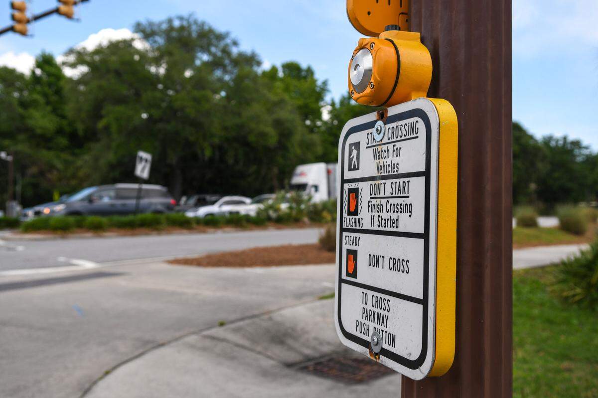 If the pedestrian push button is not selected, small black boxes under the pedestrian signals at Mathews Drive and William Hilton Parkway have thermal imaging cameras that sense when pedestrians are waiting to cross with Hilton Head Island’s new adaptive signal system. If pedestrians leave the zone the system goes back to managing traffic.