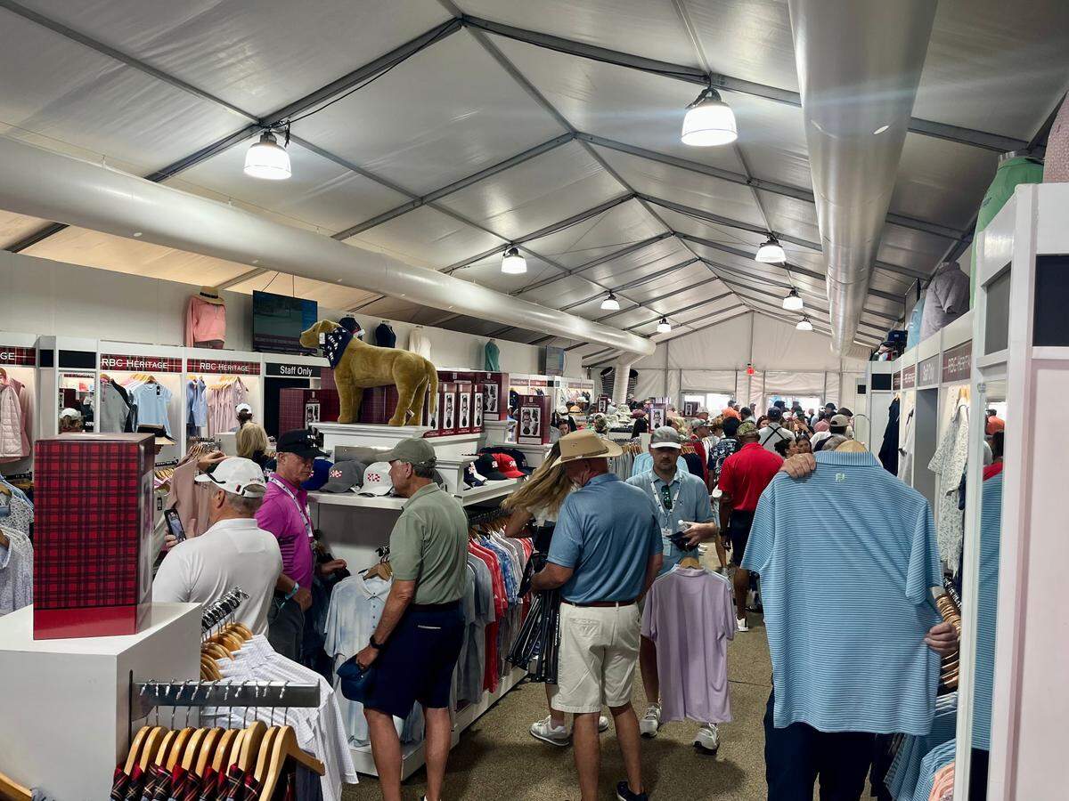 Spectators shopping and browsing inside of the RBC Heritage Golf Shop on Friday, April 18, 2025