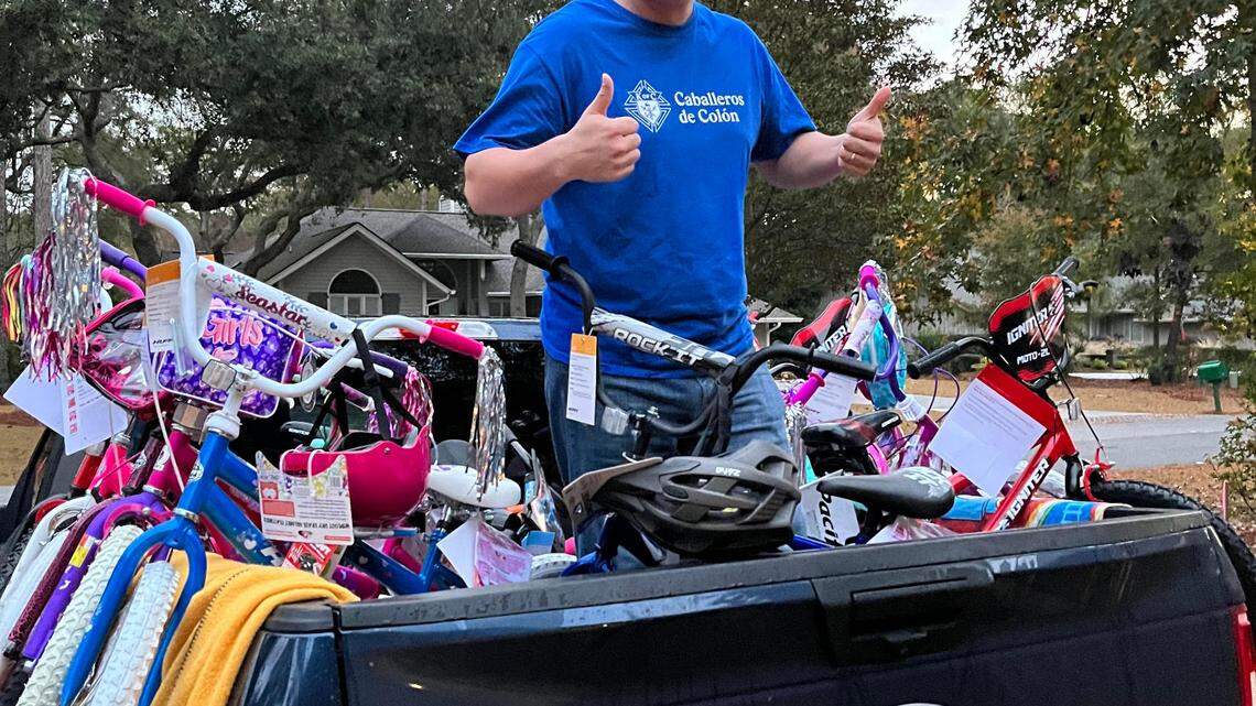 Hilton Head parishioners gift 50 bikes from Santa to children before Christmas Day