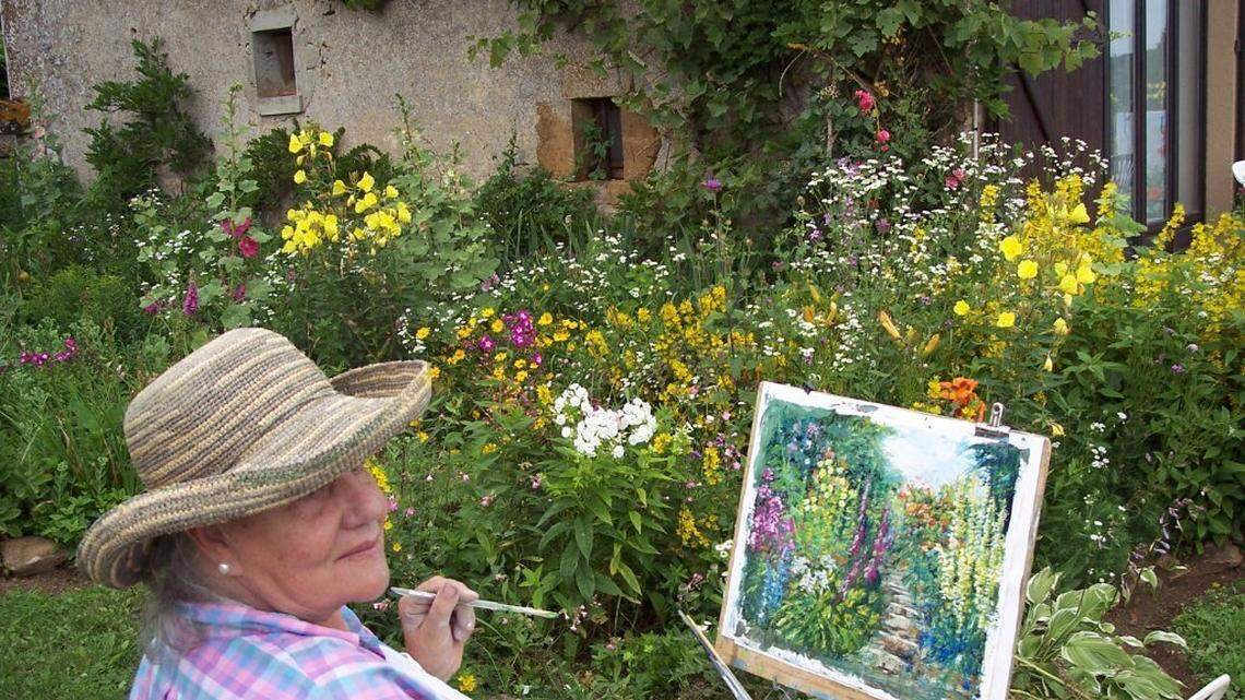 Uschi Niner painting en plein air.