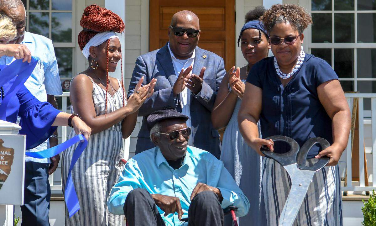 On June 10, 2022, Beaufort-born pastor and former S.C. Sen. Clementa Pinckney’s family came to the Town of Port Royal for a dedication and ribbon cutting at the renovated ‘Pinckney’ Porter’s Chapel, a small church where Clementa preached when he was 23. Pictured clockwise, from left: daughter Eliana Pinckney, 18; state State Sen. Gerald Malloy; daughter Malana Pinckney, 13; wife Jennifer; father John Pinckney.