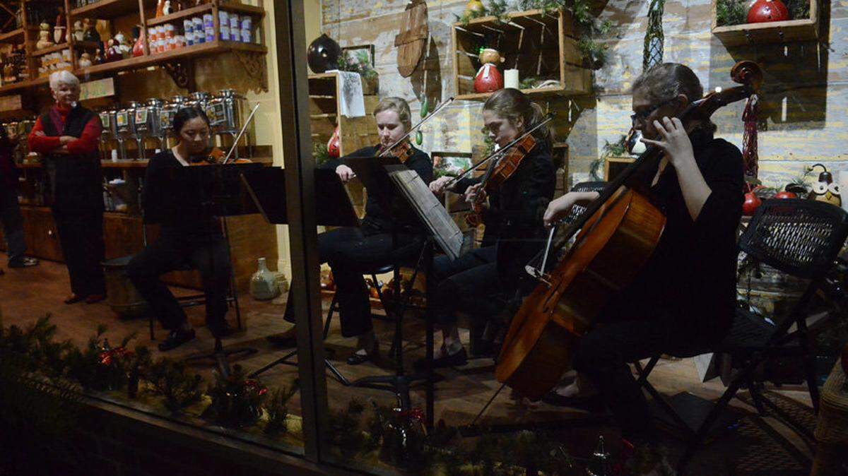 Downtown Beaufort began to usher in the holiday season with A Night on the Town on Dec. 5, 2014, featuring the Parris Island Marine Corps Band, choral performances, a living windows display, Santa and a tree lighting.