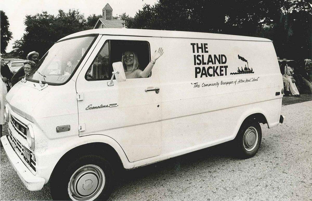 With The Island Packet emblazoned on the side of a 1970s era Ford Econoline 100 van, a circulation person waves to the camera in this undated photo.