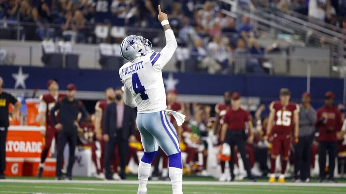Dallas Cowboys quarterback Dak Prescott celebrates a touchdown against Washington. He’s a hot property in many of this week’s fantasy drafts.