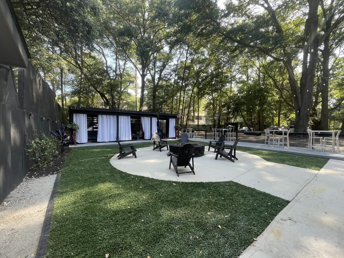 The patio, fire pit and cabanas at Good Soul Southern Kitchen