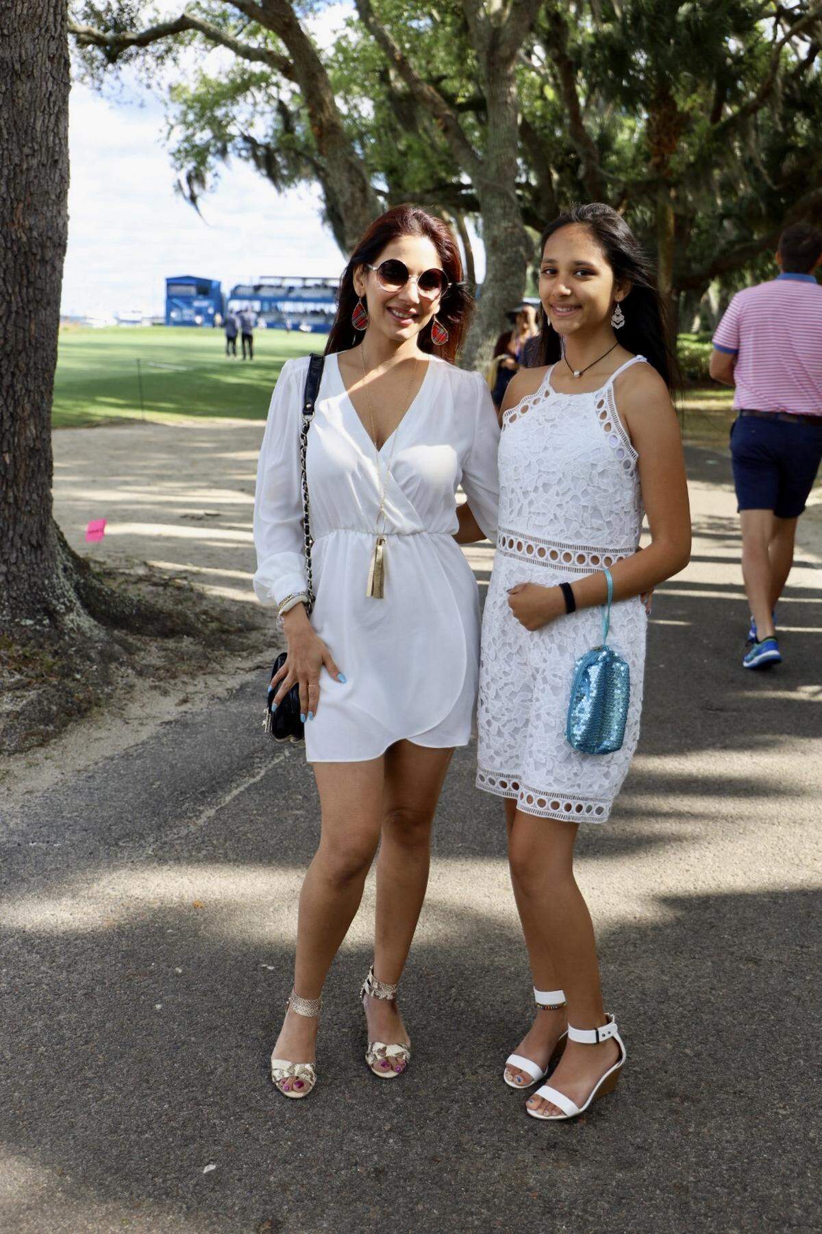 Puneeta, left, and Arya Gupta, right, are from the Hilton Head Island area and looked absolutely stunning Saturday morning, matching each other in white. The mother and daughter duo said they “did plan to match their outfits.” Even though the weather was cooler than usual, Arya chose to go without a jacket because she felt “it would take away from the overall look of her outfit.” They attend Heritage each year and said they look forward to celebrating the event with family and friends. Puneeta has also incorporated some plaid into her look by wearing earrings from the Little Fish BOATEAK.