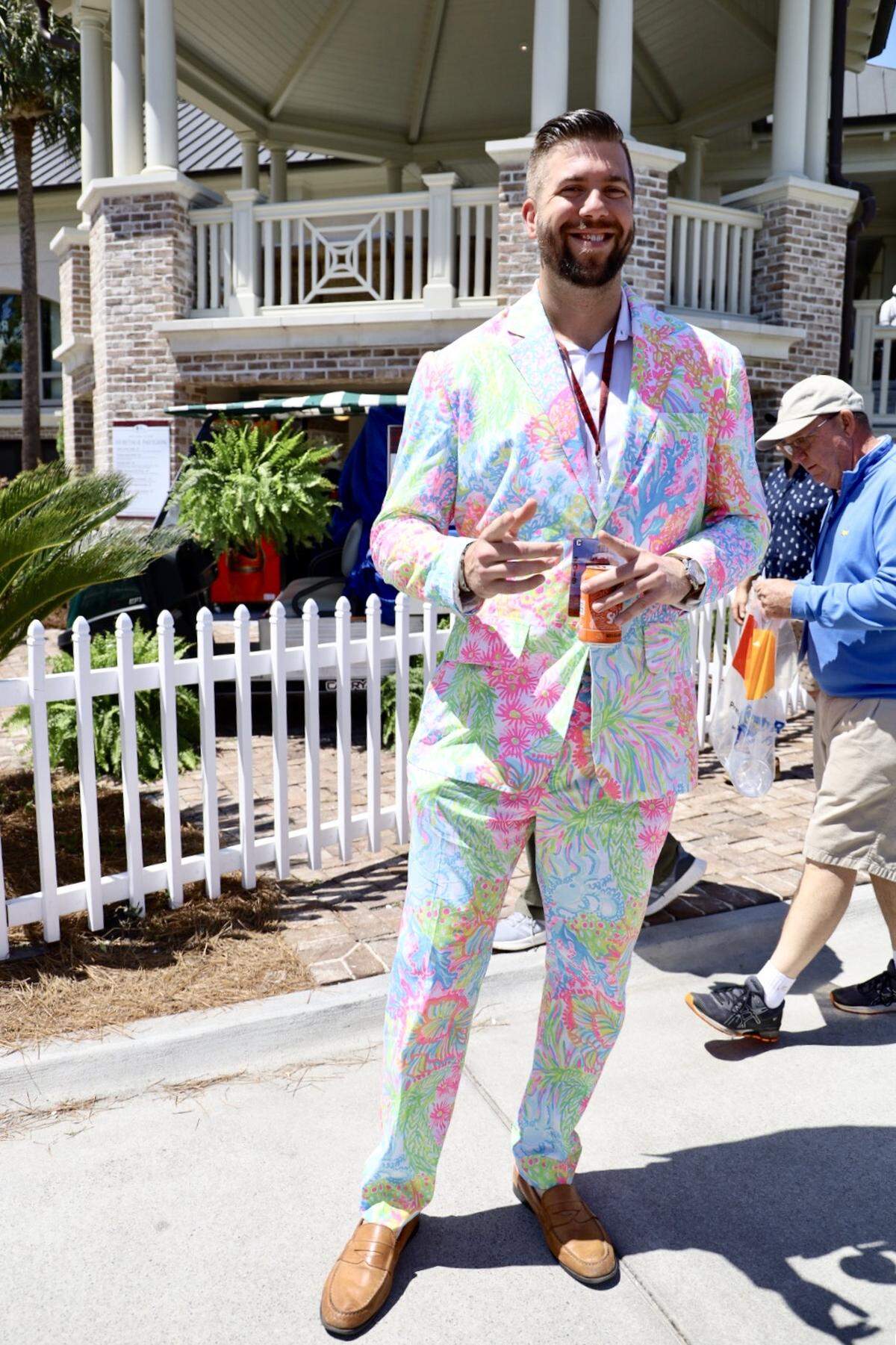 Adam Ruonala of Charleston makes his Heritage appearance in a bright pink and neon green Lilly Pulitzer suit.