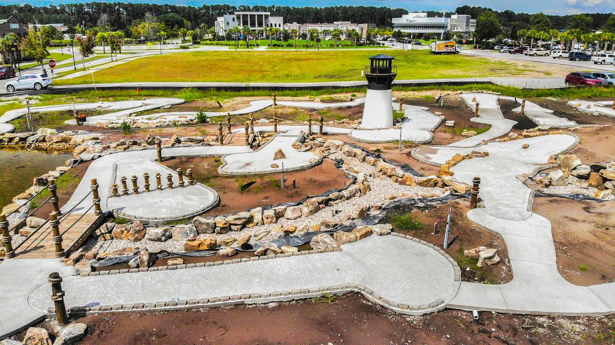 Bluffton’s first mini-golf, it’s centerpiece a lighthouse painted to resemble Hunting Island’s lighthouse, is nearing completion as seen on Wednesday, Aug. 31, 2022 at Buckwalter Place. Lighthouse Lagoon Mini Golf, expected to open before the end of the year, will also have a 1,300-square foot building for concessions and a 40-seat pavilion.