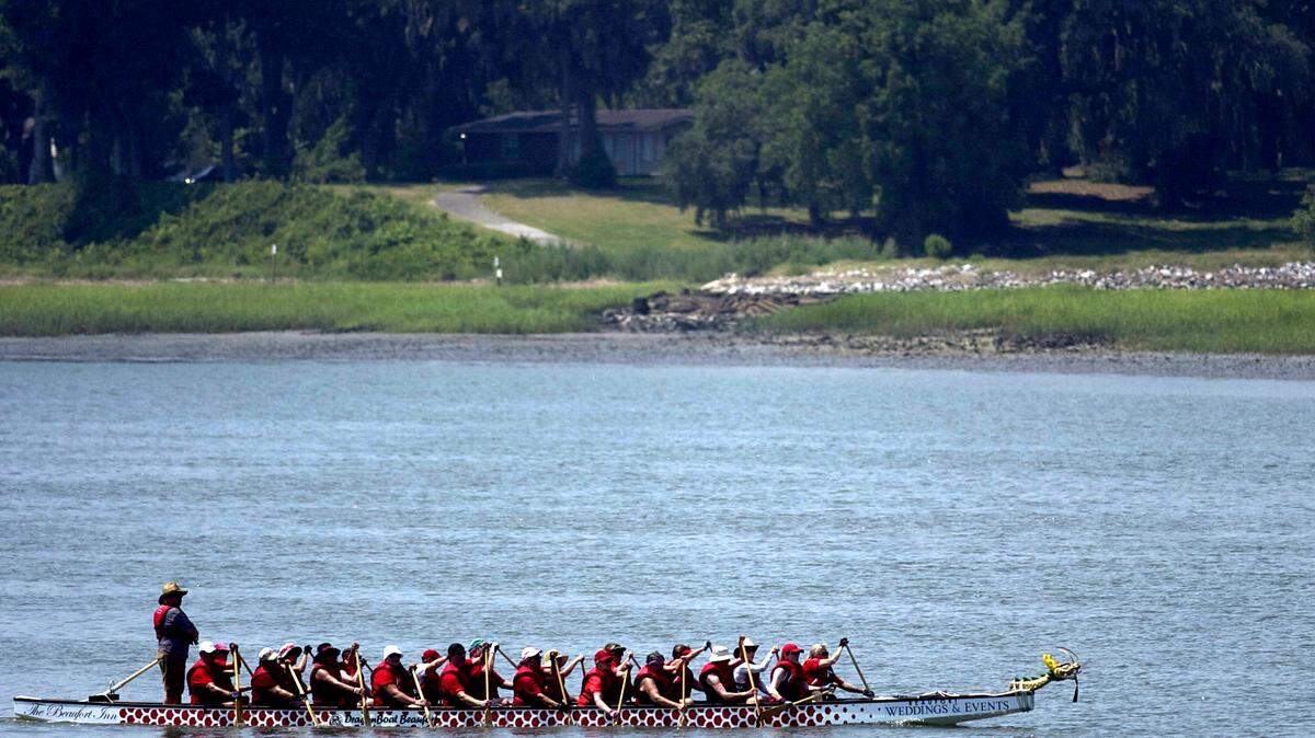 FILE: The DragonBoat Beaufort team rows toward the dock at Port Royal Landing on June 30, 2012.  The practice was the team's first in its new dragon boat.