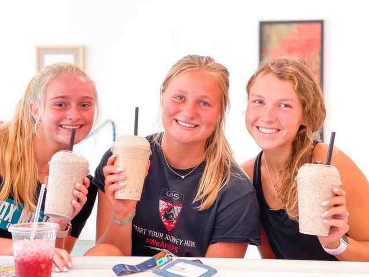 Customers enjoy shakes at Okatie Nutrition recently.