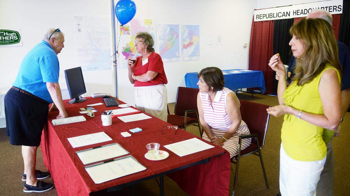 From left, Paul DiBlasi, Gail O'Kane, club secretary Bonnie Pastore and Angela Strom talk during the opening of the Hilton Head Island Republican Club's headquarters at Port Royal Plaza on Saturday. The office will be open daily through the Nov. 4 general election. In addition, U.S. Rep. Mark Sanford will be the featured speaker at the headquarters' grand opening on Sept. 20. A weekly Friday After Hours session from 5 to 7 p.m. will feature appearances by various Republican candidates. "We welcome people to stop in and get their bumper stickers and any information about voting," said volunteer O'Kane.
