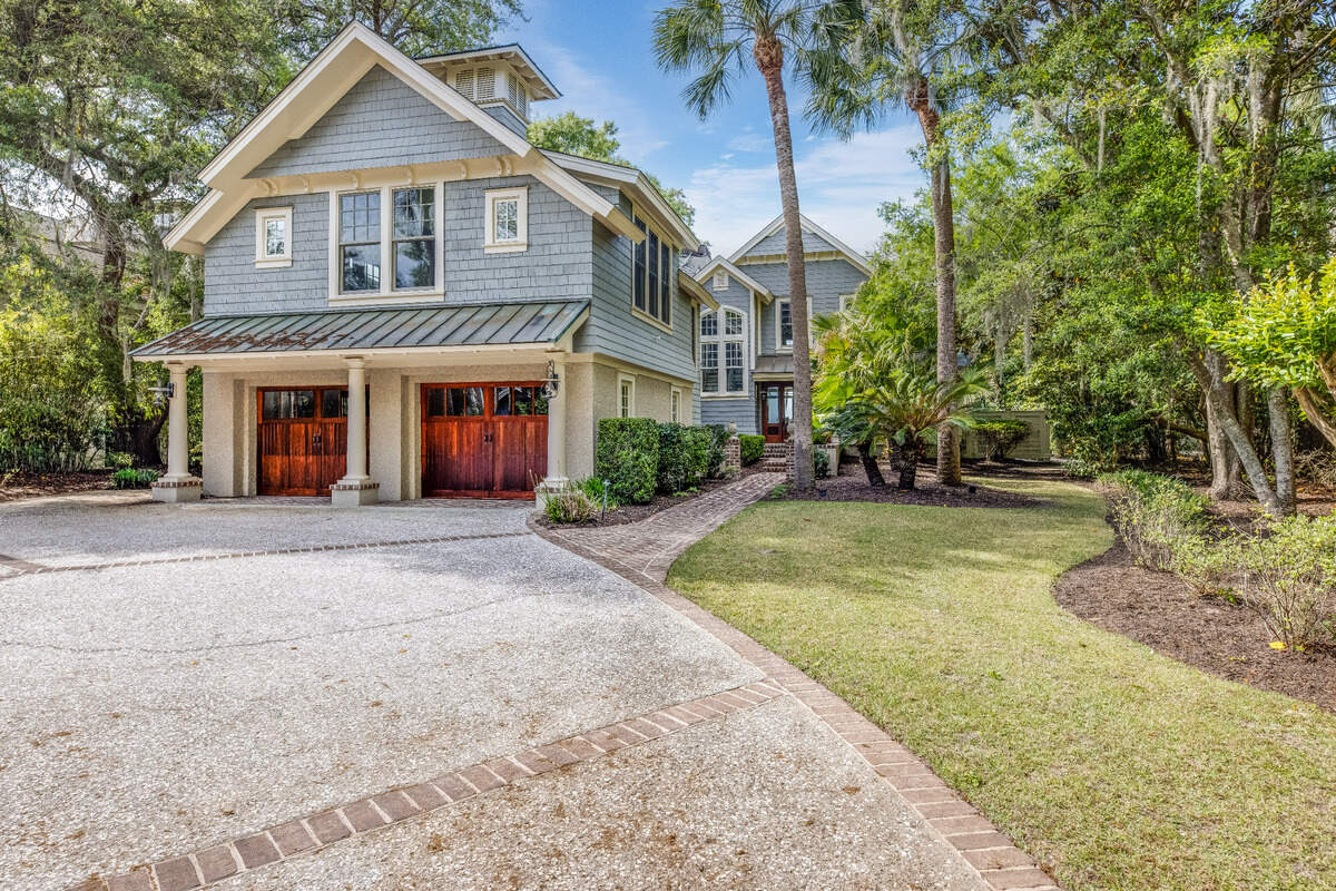 A two-car garage is at the front of the Sea Pines home.