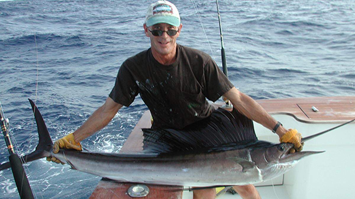Collins Doughtie with sailfish on an unforgettable day.