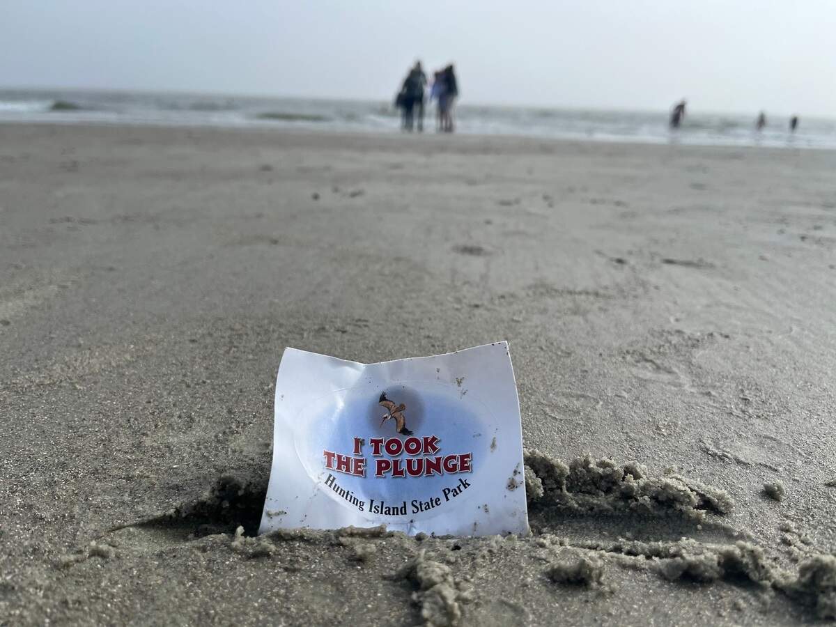 People lined up on the north beach at Hunting Island State Park to participate in the 12th annual Pelican Plunge to benefit the Friends of Hunting Island’s conservation efforts.