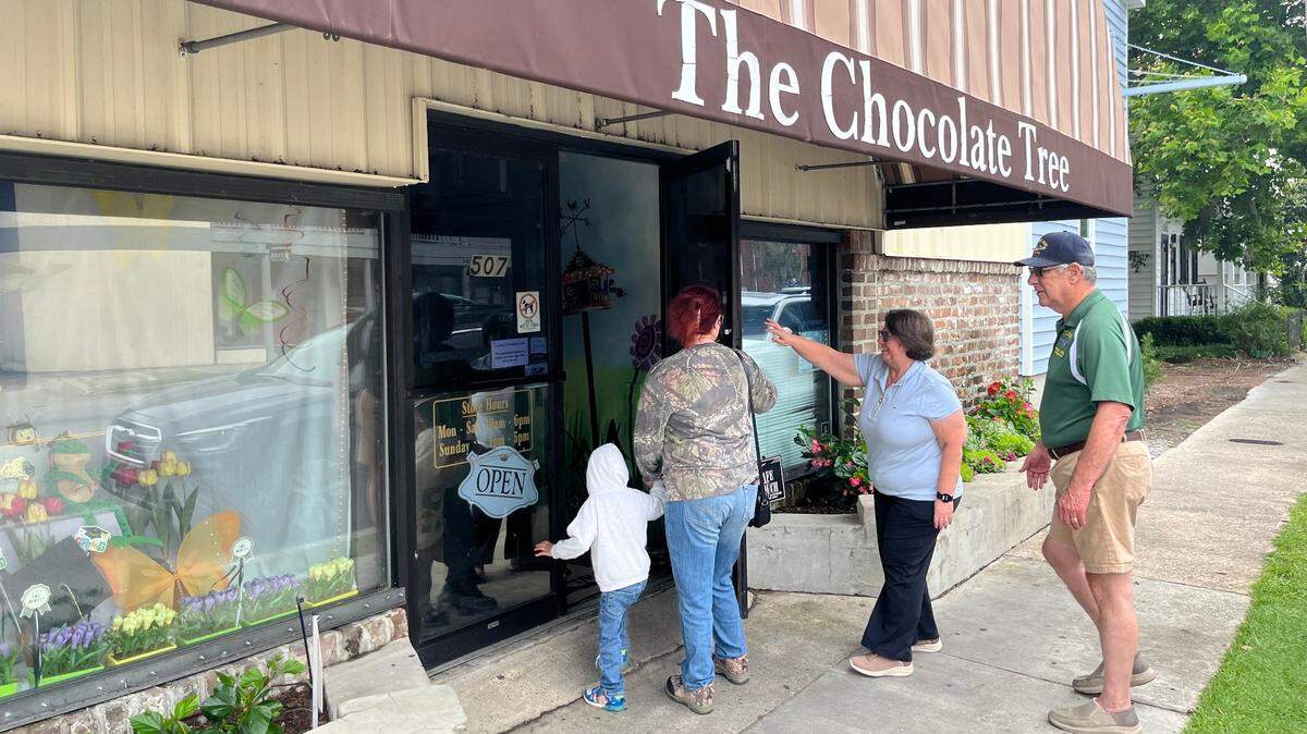 Customers file into The Chocolate Tree on Carteret Street in Beaufort Tuesday morning. Friday is reportedly the last day of business for the store, which opened in 1980.
