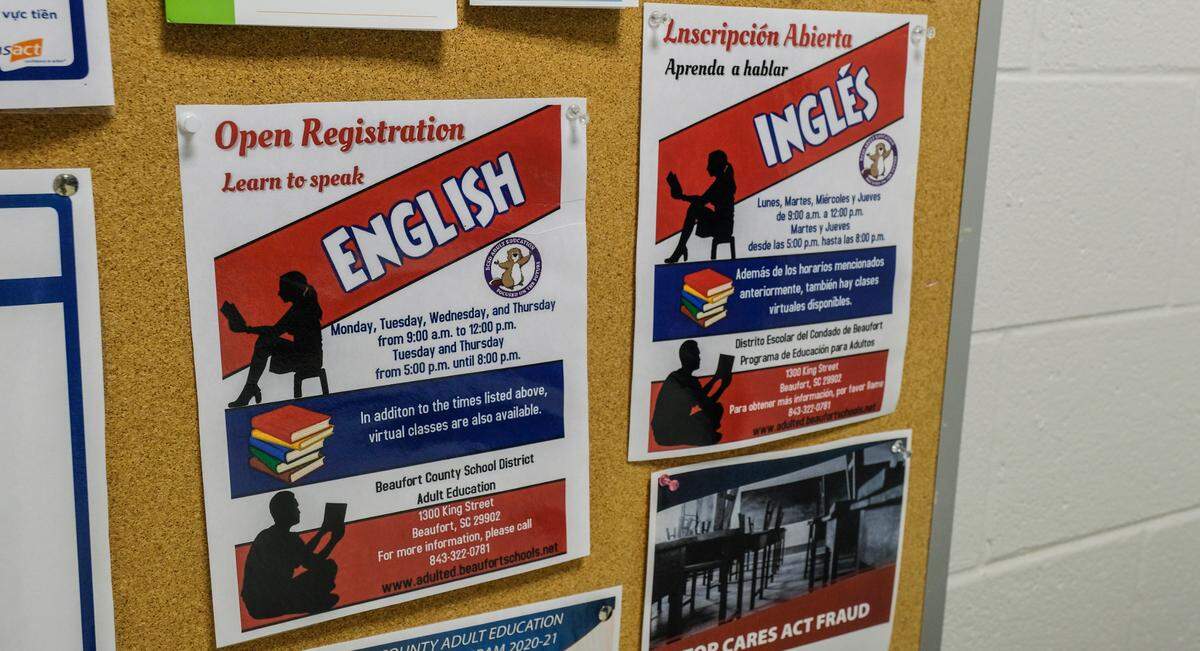 Posters in Hilton Head Island Elementary School’s office inform adults that classes to learn English, written in Spanish as well, are available through the Beaufort County School District Adult Education program.