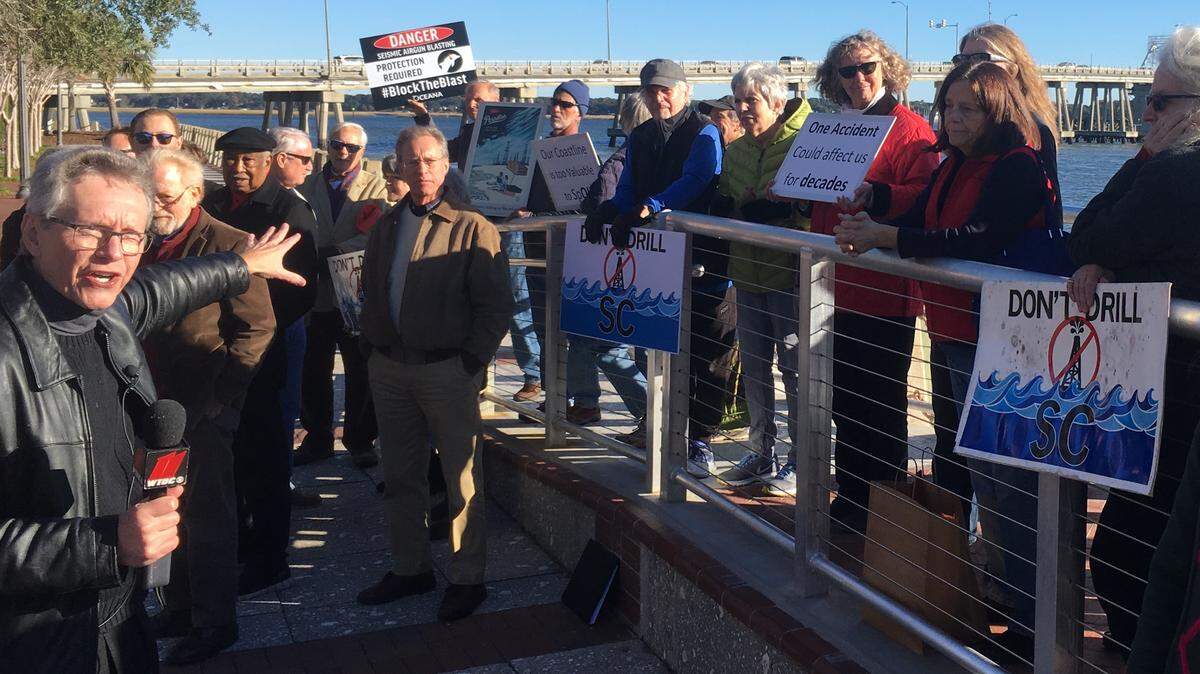Frank Knapp, left, gestures to a group gathered before a news conference in Henry C. Chambers Waterfront Park on Tuesday. Knapp, CEO of the S.C. Small Business Chamber of Commerce, was joined by Beaufort County officials to talk about a federal lawsuit filed by S.C. cities seeking to block permits allowing seismic testing for oil and gas in the Atlantic Ocean.