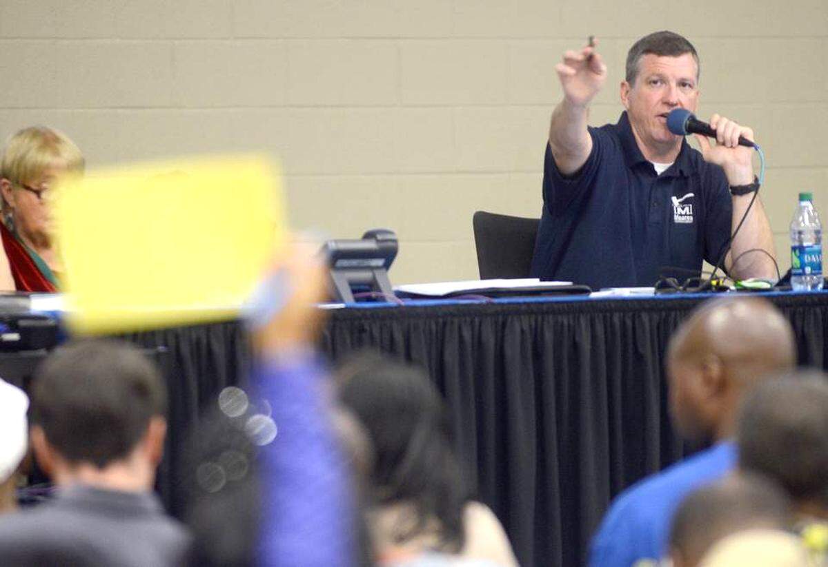 Darron Meares with Meares Auctions acknowledges a bid during the Beaufort County Delinquent Tax Auction at Charles Lind Brown Activity Center in Beaufort in this file photo from 2014.