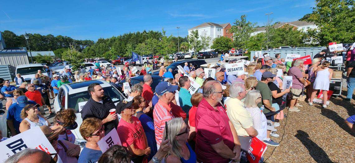 An overflow crowd gathers on Friday, June 2, 2023, outside Okatie Ale House in Bluffton, South Carolina, for Ron DeSantis’ presidential campaign stop.
