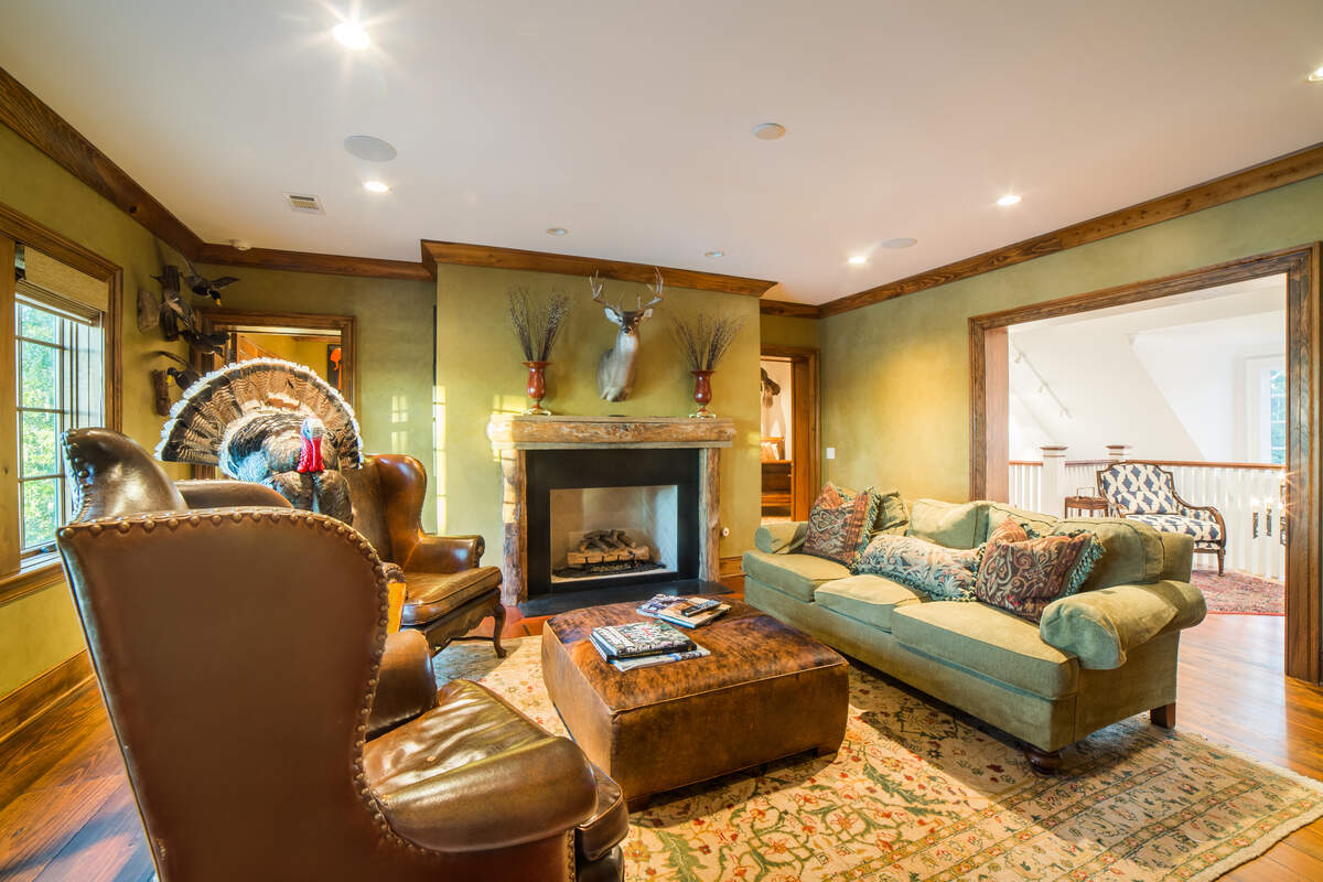 The home’s third-floor includes a man cave with more masculine decor.
