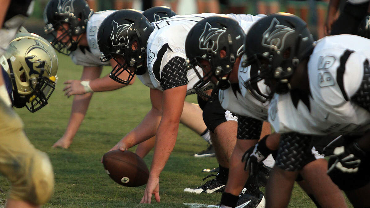 The Bluffton High School football team takes to the field in this file photo. 