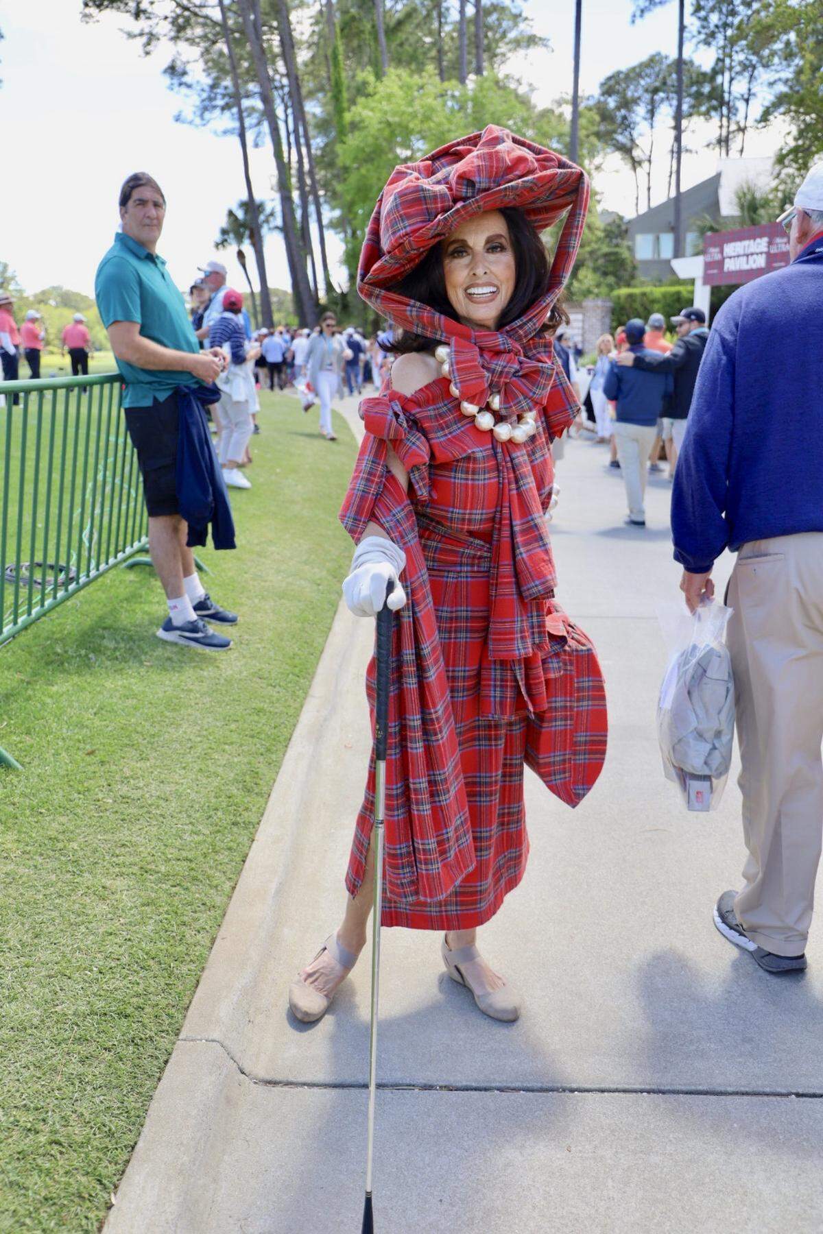 It’s hard to miss Joanna Baeren’s all-plaid outfit and many recognize her as the “woman in plaid.” After her acting career in Hollywood, Joanna moved to the Hilton Head area and has been here for 33 years. Her entire outfit from her hat to her purse is completely handmade using one single bed sheet. “I made everything from one bed sheet last night and love coming here to Heritage to walk around.”