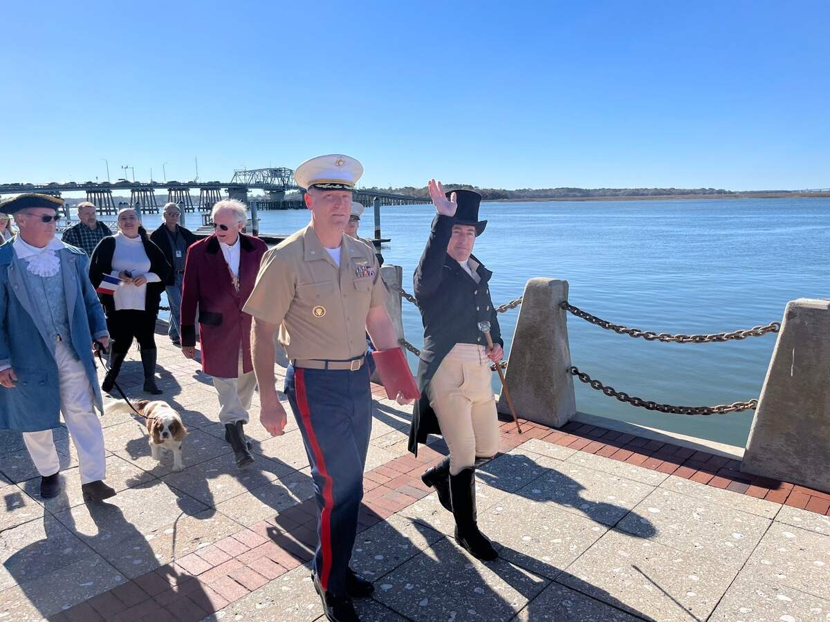 Lt. Col. Christopher Lyon of Marine Corps Air Station Beaufort and Marquise de Lafayette, played by Mark Schneider, make their way down the Beaufort Waterfront Park boardwalk Tuesday morning when the 200-year anniversary of Lafayette’s stop in Beaufort was recreated. in 1825, Lafayette was the last surviving major general from Gen. George Washington’s staff during the American Revolution.