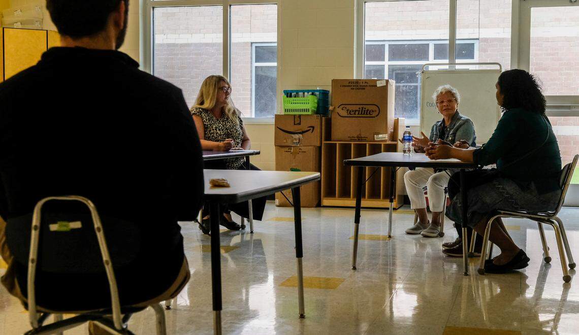 Red Cedar Elementary School in Bluffton has long set an example for how schools should support their growing Hispanic students. Rosana Hellstrom, the bilingual liaison pictured translating during a meeting, has played a significant role in that.