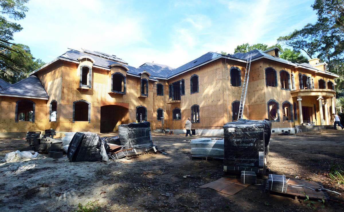 Construction on a large house on Brahms Point Road in Spanish Wells Plantation in 2012. The home has since been completed.
