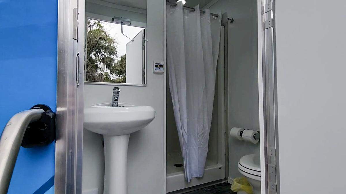 The bathroom includes a shower stall, toilet and sink in the Showers of Dignity trailer operated by the United Way of the Lowcountry at the non-profits office on Feb. 20, 2025, in Beaufort.