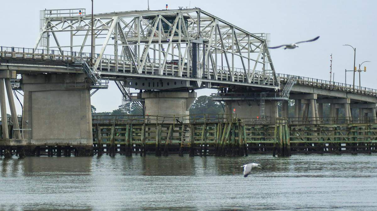 Sea gulls fly in front of the Richard V. Woods Memorial Bridge as pictured on Dec. 5, 2022, the last remaining swing bridge in Beaufort County.