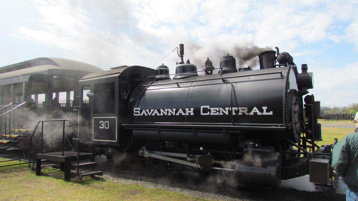 A fully restored and operational steam locomotive at the Georgia State Railroad Museum in Savannah.