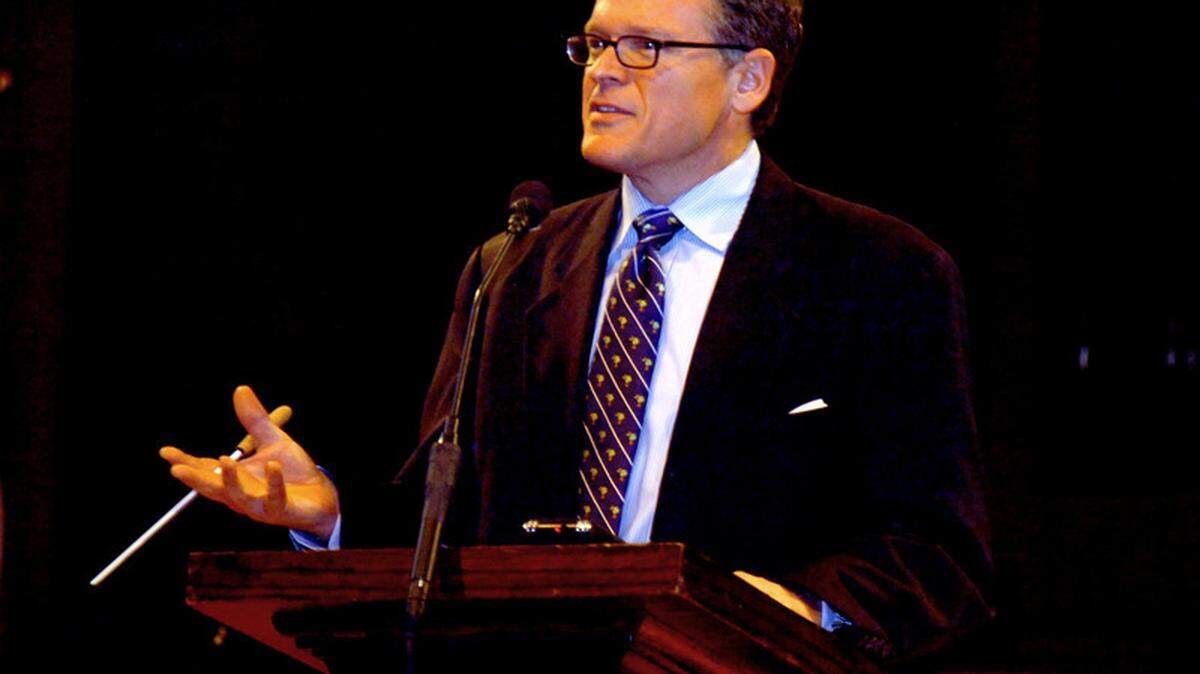 John Morris Russell speaks during a news conference when it was first announced that he would be the principal guest conductor for the Hilton Head Symphony Orchestra, in 2011.