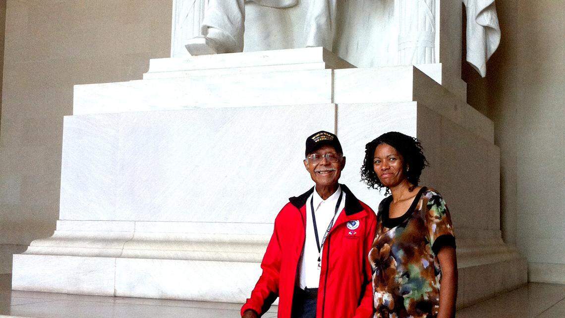 Lee McKinnon and his granddaughter, Dr. Gwennaye Cherie Coath, reflect on America’s dream at the Lincoln Memorial.
