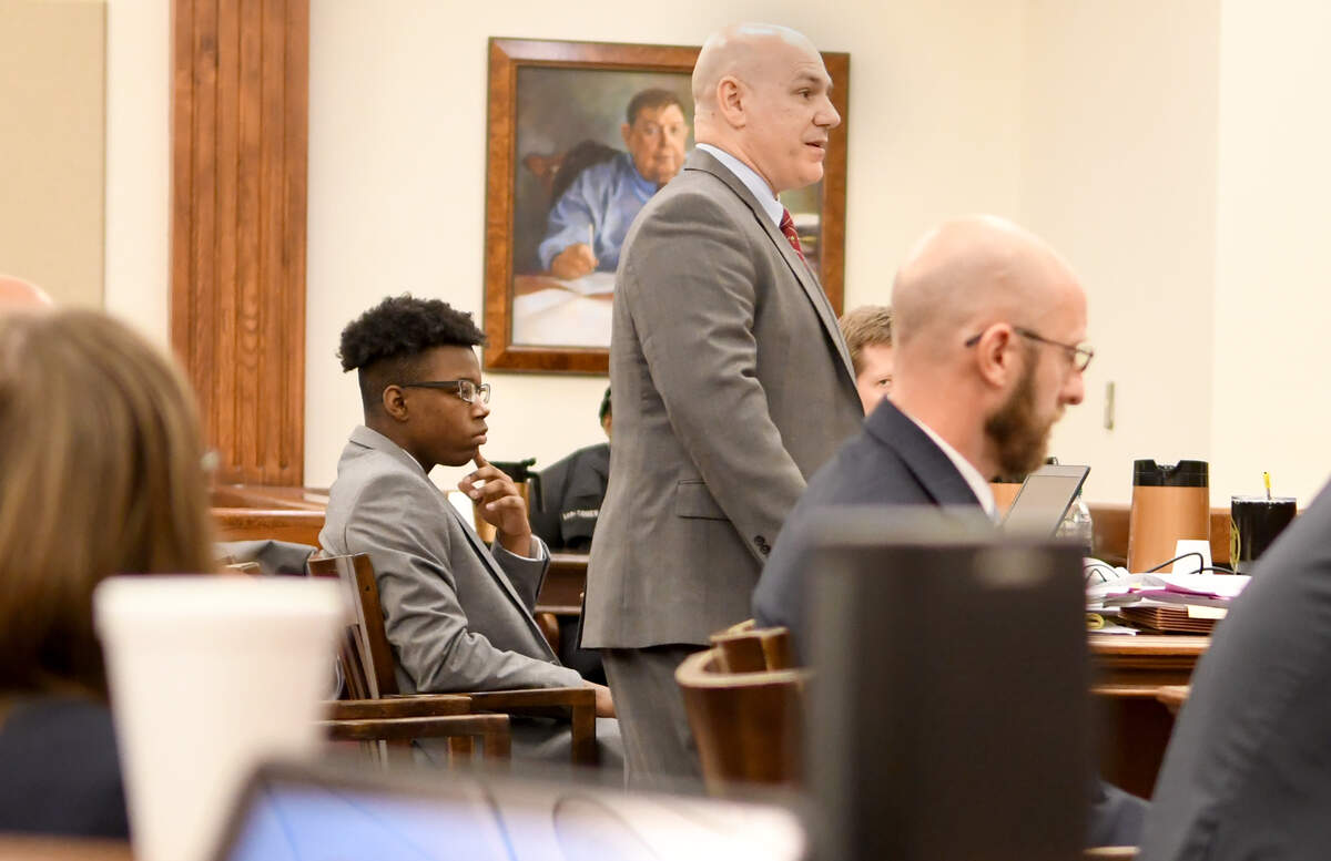 John Ira Duncan III, left, listens as his defense attorney Jeffrey Stephens, standing, questions Jestin Morrow, not pictured, on Tuesday afternoon at his murder trial at Beaufort County Courthouse.