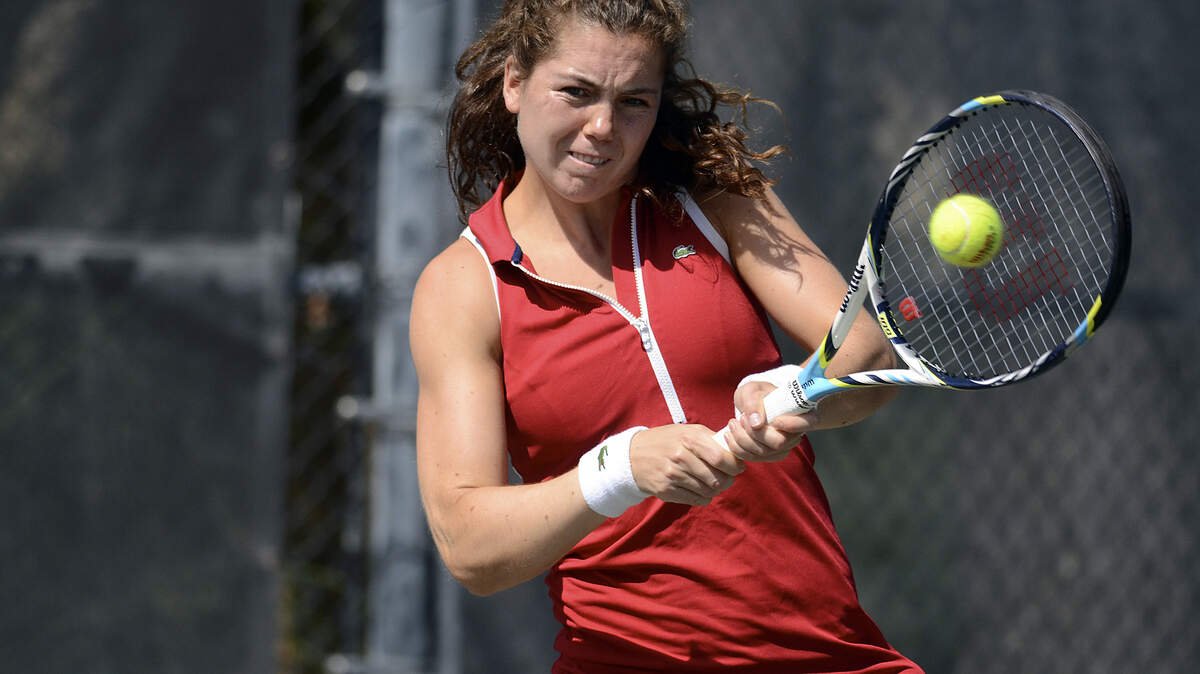 Ulrikke Eikeri of Norway hits the ball back to her opponent, Michelle Sammons of South Africa, during their match on Thursday afternoon during the second round of the Van der Meer Shipyard Women's $10,000 Event at Van der Meer Shipyard Tennis Resort on Hilton Head Island.