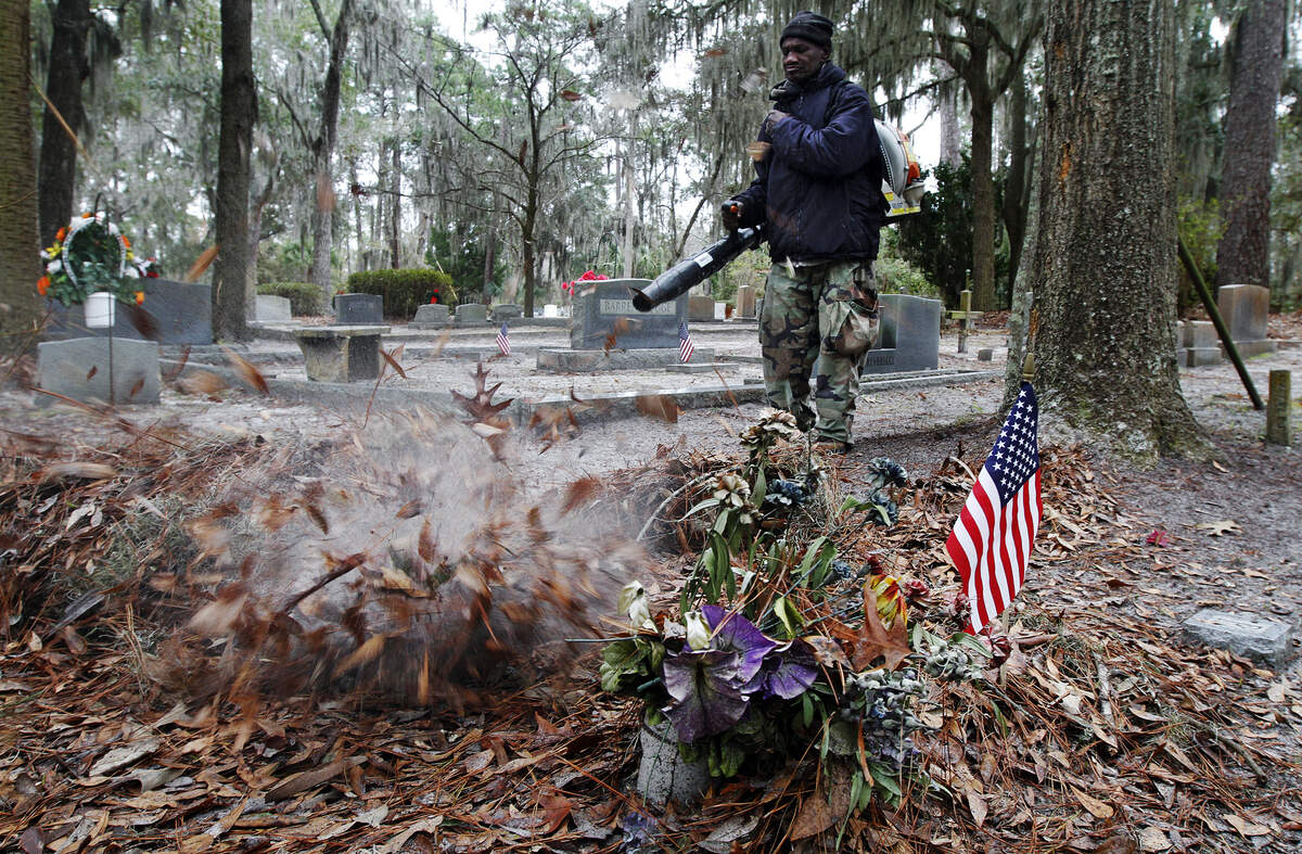 Gas leaf blowers are widely used in Beaufort County communities, to the bane of some residents. Here, Tyrone Hamilton, a worker with Wesley Bush Jr Landscaping, of Bluffton, uses a leaf blower during clean up of the Bluffton Cemetery on Jan. 15, 2015.