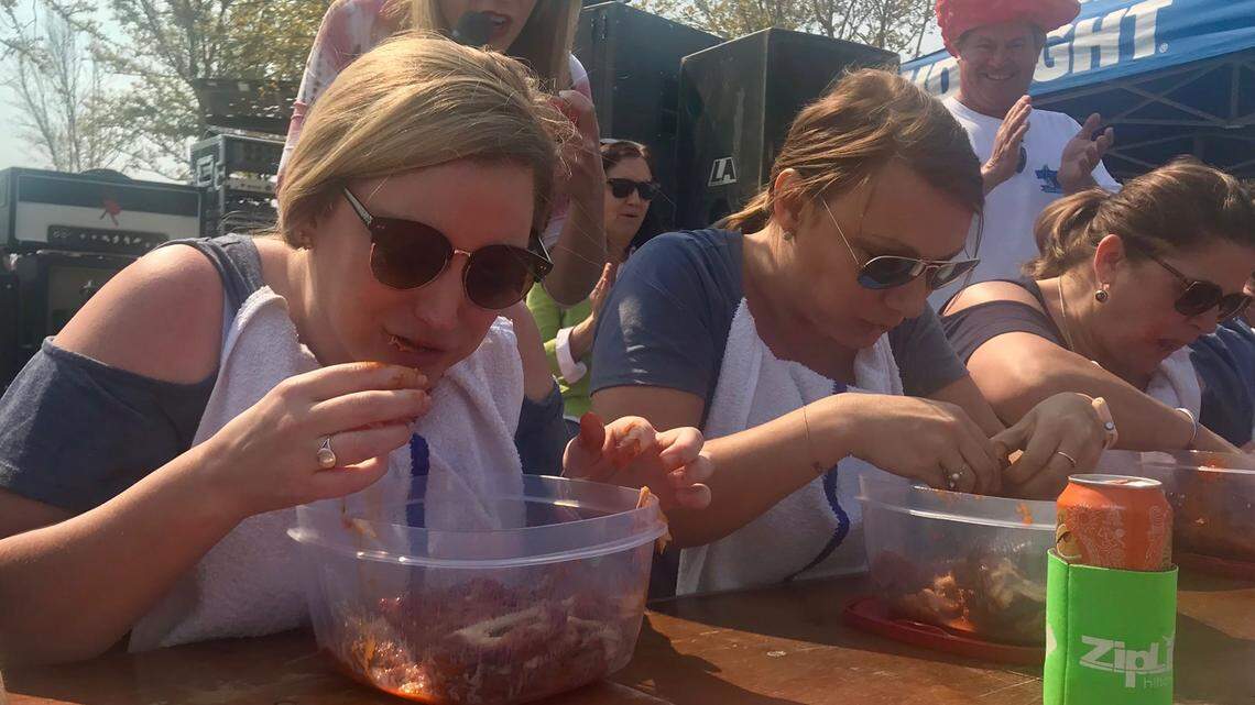 Participants chomp down as many wings as possible for two minutes during the 2018 Hilton Head Wingfest on Saturday, March 24.