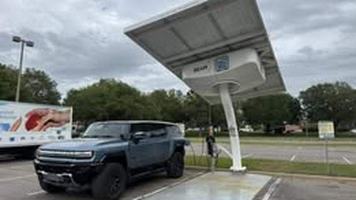 An electric vehicle charges at a new charging station in Beaufort at the Beaufort County Government Center. It’s being offered free of charge by the county.