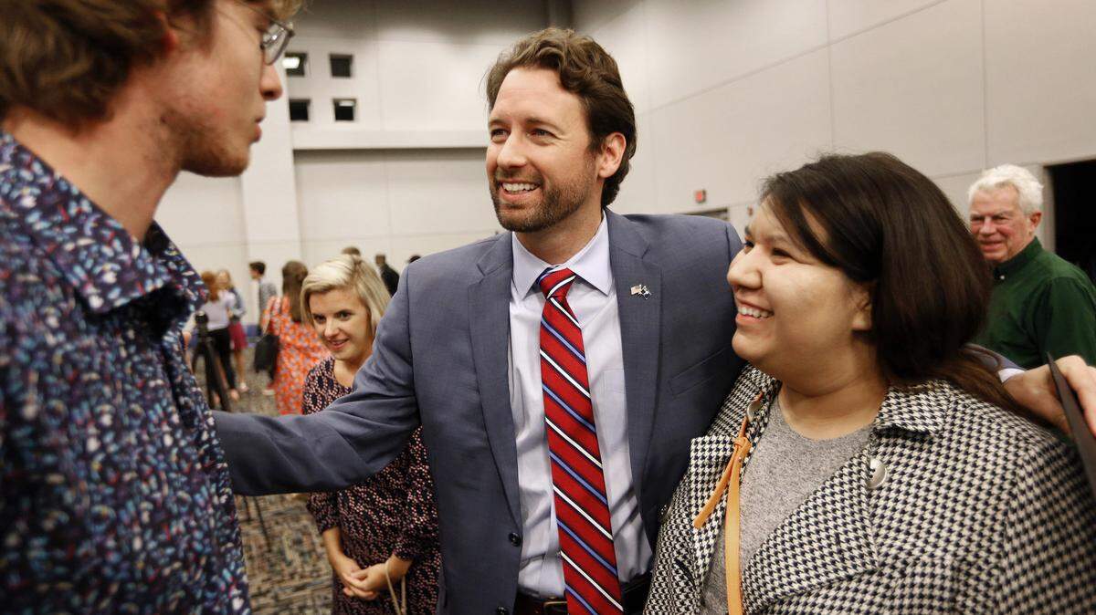 Democrat Joe Cunningham, center, greets supporters after his victory press conference at the International Longshoremen’s Association hall in Charleston, S.C., Wednesday, Nov. 7, 2018. Democratic U.S. House candidate Cunningham used a personal touch and concern for local issues like offshore drilling to beat a Republican in conservative South Carolina.