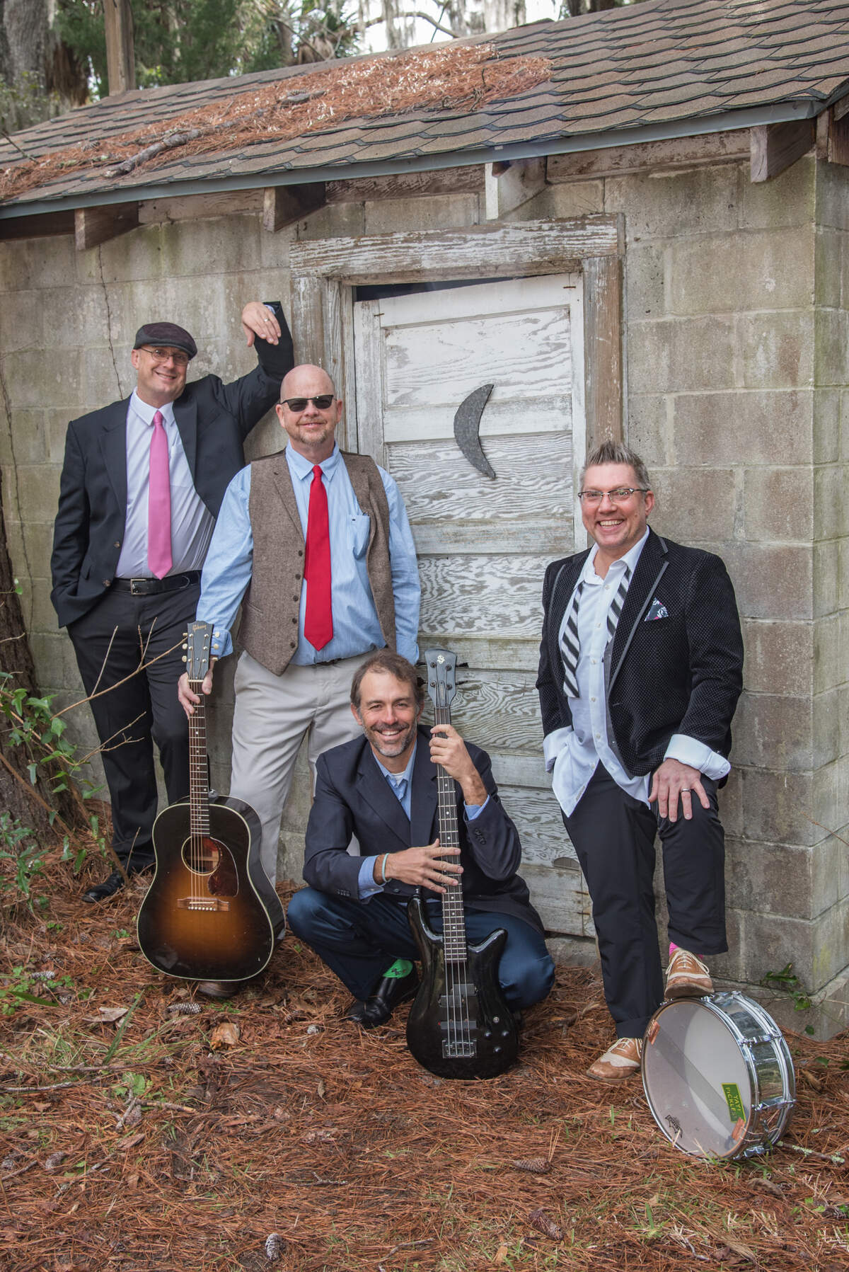 Gary Pratt (far left) poses among JoJo Squirrel and the Home Pickles band mates, including Mike Kavanaugh, Jevon Daly and Chip Larkby.