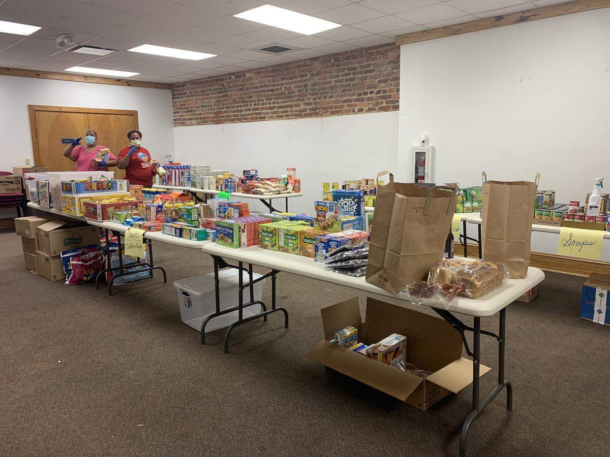Volunteers in the Bull Durham Center in Estill sort through donations on April 21, 2020, to help survivors of the tornado from a week earlier.