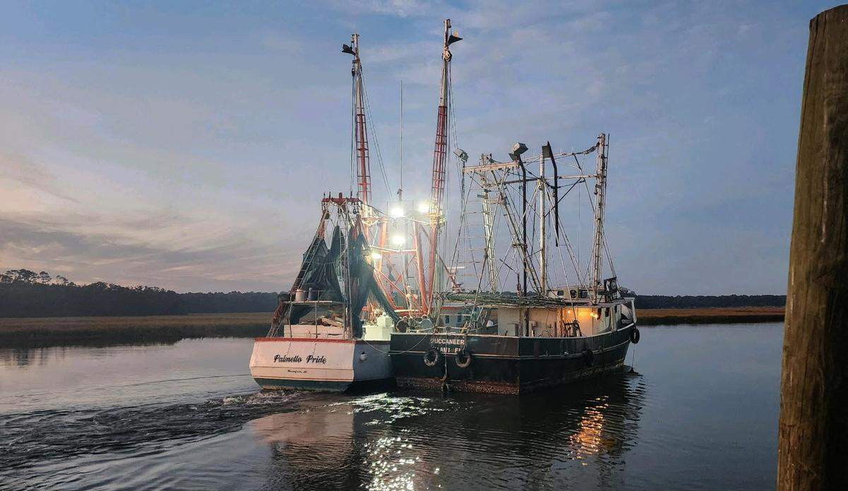 The Palmetto Pride tows the Buccaneer from St. Helena Island to the Betsy Ross Reef, where it was sunk.