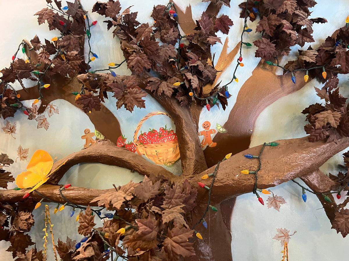 A chocolate tree adorns the wall at the front entrance of The Chocolate Tree.
