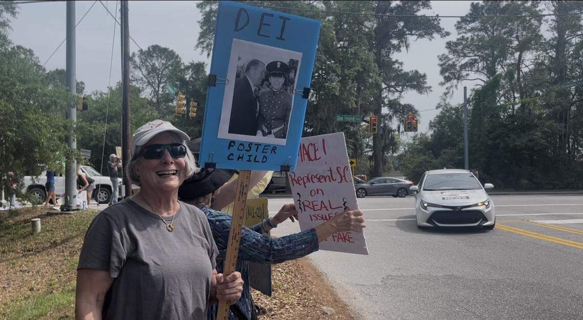 Susan Boyd, a 27-year Beaufort resident, stood among other a group of demonstrators on the corner of Sea Island Parkway and Polowana Road minutes before U.S. Representative Nancy Mace attended a town hall on Dataw Island.