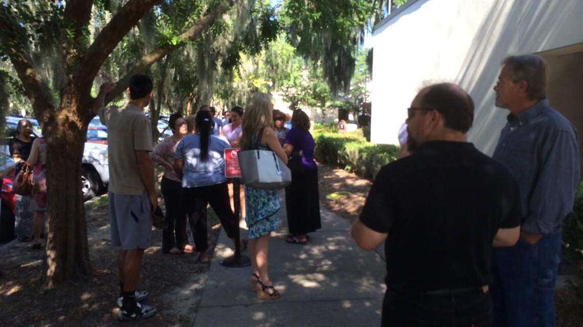 People interested in a preliminary hearing for Joel Iacopelli gather outside Beaufort County Magistrate Court the morning of Aug. 14, 2015.