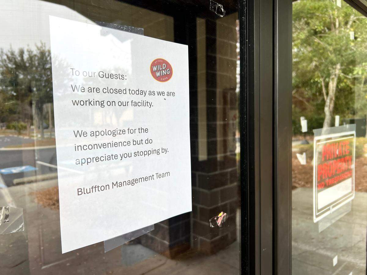A sign posted on the door of the Bluffton Wild Wing Cafe location says the restaurant is closed.