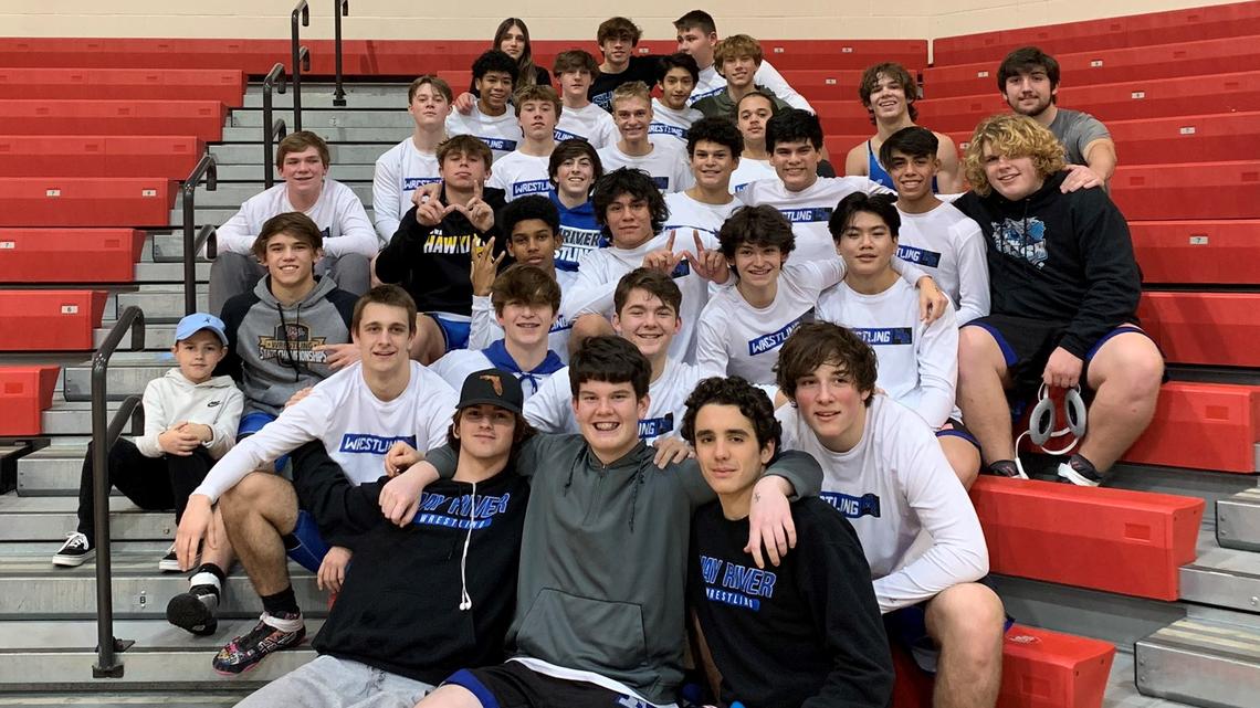 May River wrestlers pose for a photo after winning the Class 4A lower state championship on Feb. 9, 2022.