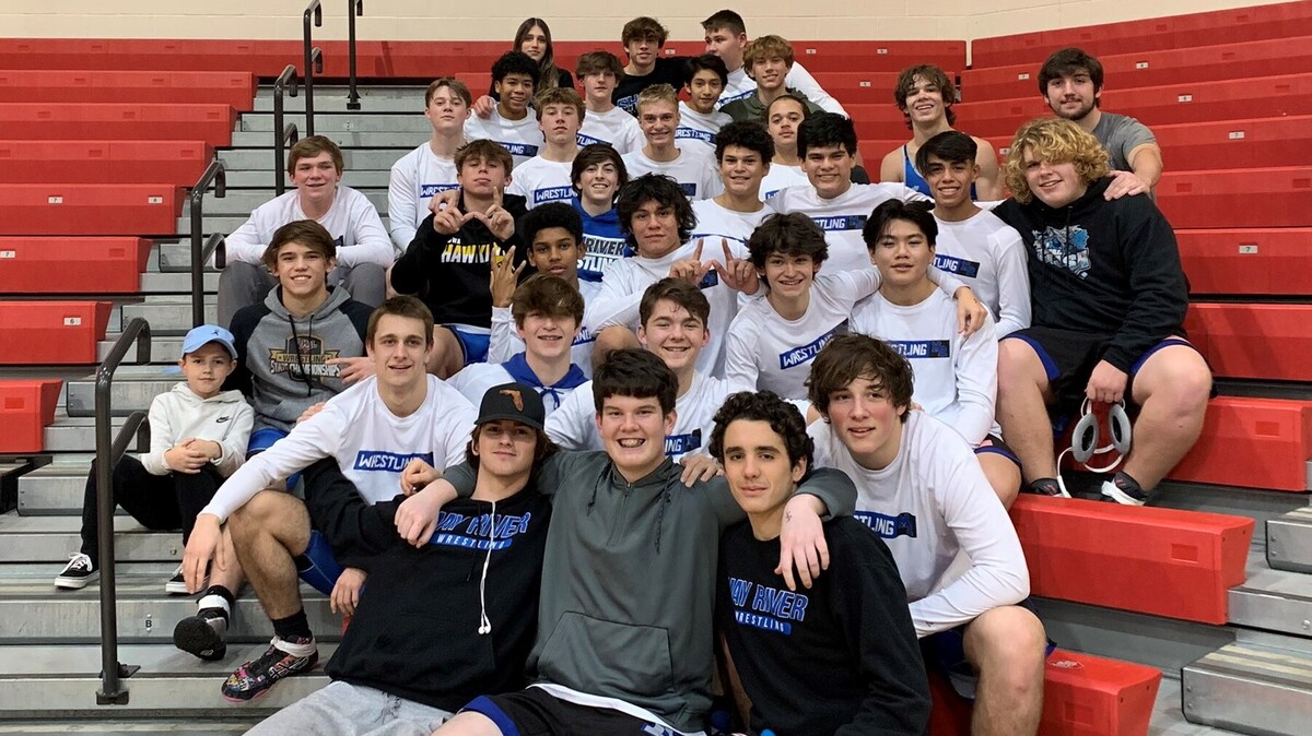 May River wrestlers pose for a photo after winning the Class 4A lower state championship on Feb. 9, 2022.